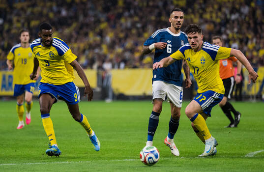 Alexander Isak and Viktor Gyökeres of Sweden compete for