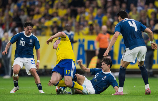 Viktor Gyökeres of Sweden and Panagiotis Retsos of Greece