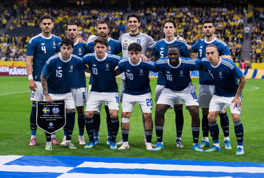 The starting eleven of Greece pose for a photo