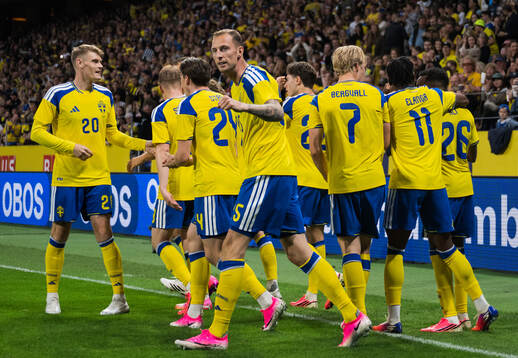 Gustaf Nilsson of Sweden celebrates with team mates