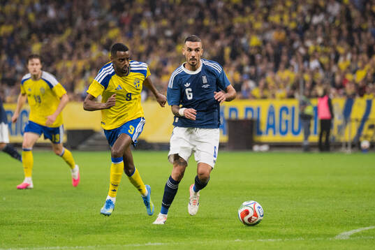 Alexander Isak of Sweden and Dimitris Kourbelis of Greece