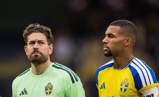 goalkeeper Kristoffer Nordfeldt and Isak Hien of Sweden