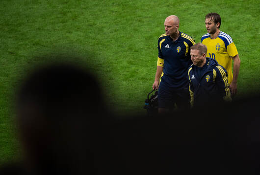 Benjamin Nygren of Sweden leaves the pitch due to injury