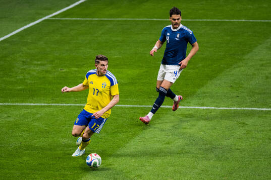 Viktor Gyökeres of Sweden and Ntinos Mavropanos of Greece