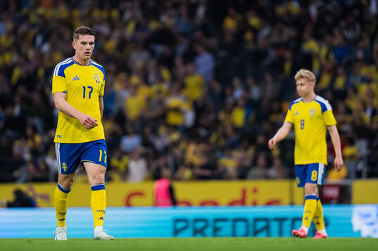 Viktor Gyökeres and Daniel Svensson of Sweden look dejected