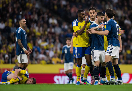 Alexander Isak of Sweden reacts at Panagiotis Retsos of