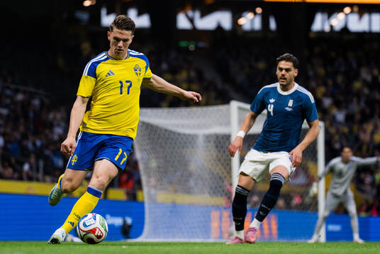 Viktor Gyökeres of Sweden and Ntinos Mavropanos of Greece