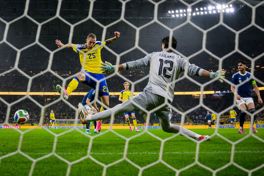 Gustaf Nilsson of Sweden scores the 2-1 goal behind