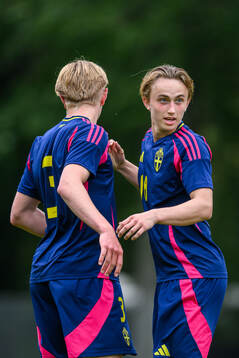 Hampus Thorsson and Alexander Berisson celebrate scoring