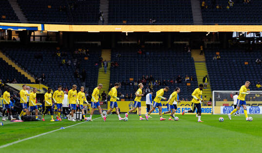 Players of Sweden enter the pitch