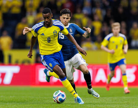 Alexander Isak of Sweden and Lazaros Rota of Greece