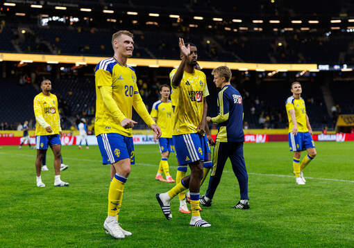 Eric Smith and Alexander Isak of Sweden