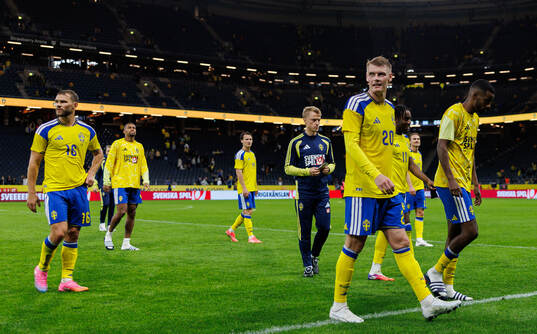 Eric Smith and Alexander Isak of Sweden