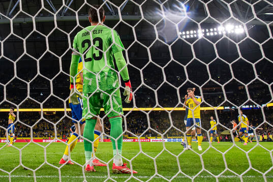 Carl Starfelt of Sweden looks dejected