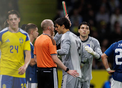 Goalkeeper Kostas Tzolakis is substituted off for