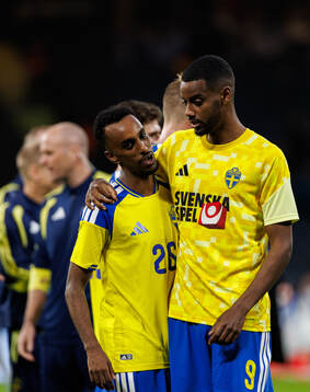 Taha Ali and Alexander Isak of Sweden