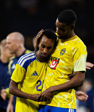 Taha Ali and Alexander Isak of Sweden