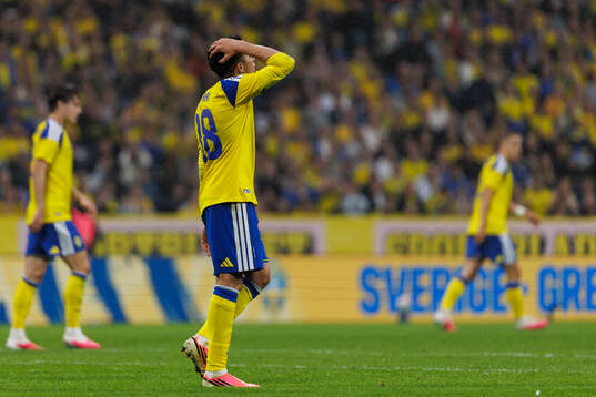 Yasin Ayari of Sweden looks dejected