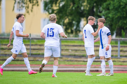 Akseli Puukko and Matias Siltanen of Finland celebrates