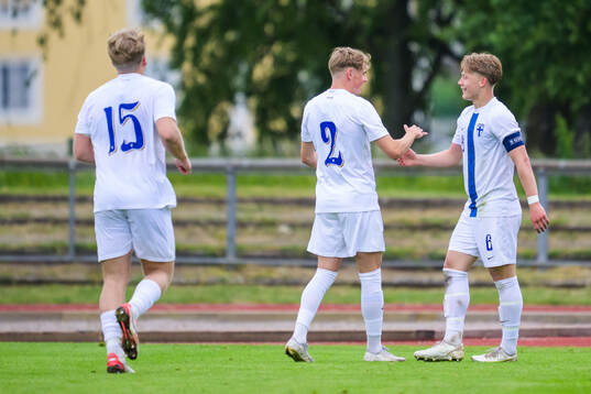 Akseli Puukko and Matias Siltanen of Finland celebrates