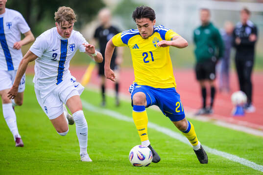 Akseli Puukko of Finland and Alexander Thongla-Iad Warneryd