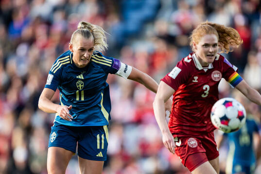 Stina Blackstenius of Sweden and Stine Ballisager Pedersen