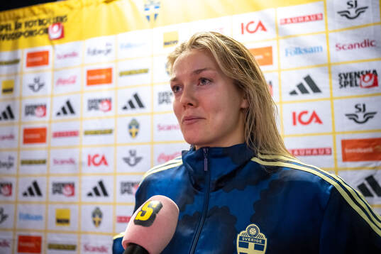Beata Olsson of Sweden in mixed zone