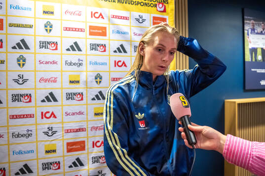 Stina Blackstenius of Sweden in mixed zone