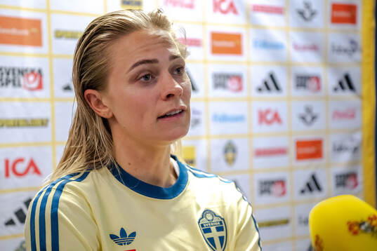Fridolina Rolfö of Sweden in mixed zone