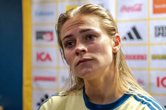 Fridolina Rolfö of Sweden in mixed zone