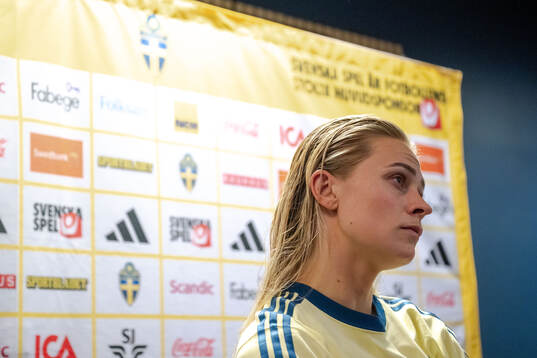Fridolina Rolfö of Sweden in mixed zone