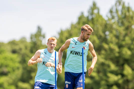 Sondre Langås and Kristoffer Ajer of the Norwegian