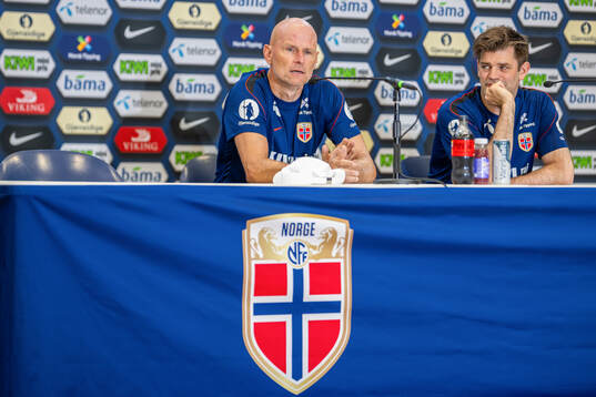 Head coach Ståle Solbakken and press officer Morten