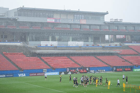 Players of the Swedish national football team in the rain