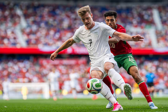 Alexander Sørloth of Norway and Chadi Riad of Morocco