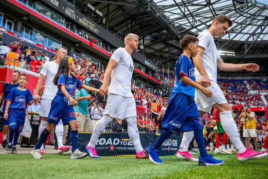 Julian Ryerson and Alexander Sørloth of Norway enter the