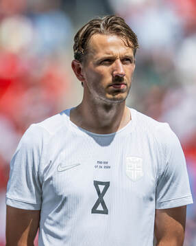 Sander Berge of Norway line up