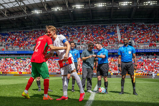 Achraf Hakimi of Morocco and Martin Ødegaard of Norway