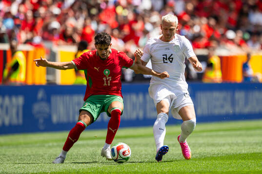 Abde Ezzalzouli of Morocco and Julian Ryerson of Norway
