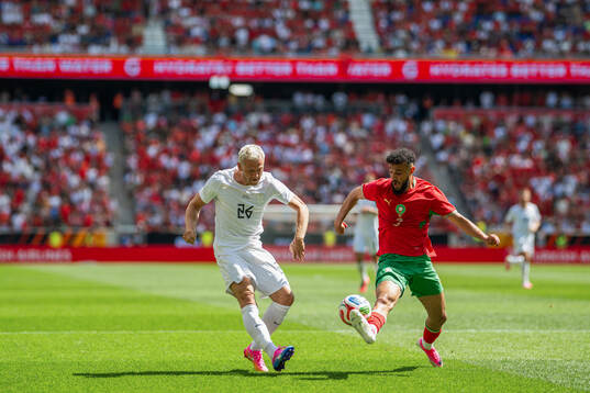 Julian Ryerson of Norway and Noussair Mazraoui of Morocco