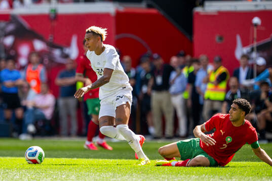 Antonio Nusa of Norway and Achraf Hakimi of Morocco