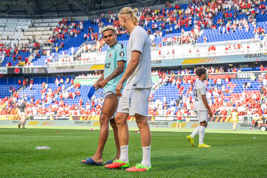 Antonio Nusa and Erling Braut Haaland of Norway