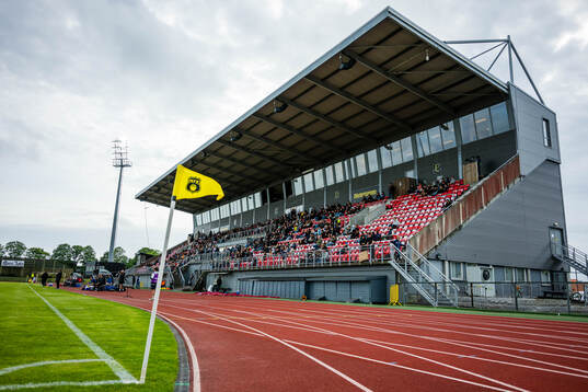 Spectators in the stands at Melløs Stadion