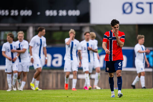 Magnus Riisnæs of Norway looks dejected