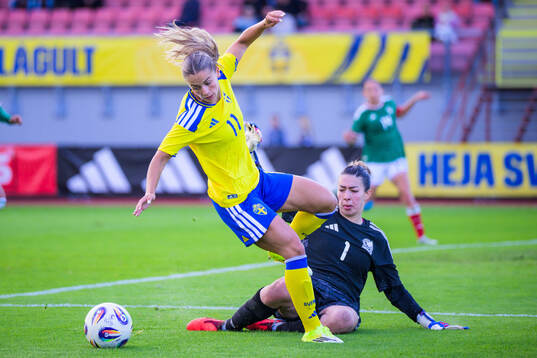 Johanna Renmark of Sweden and Goalkeeper Celeste Maryel