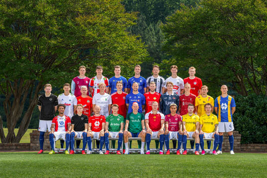 Picture has been retouched with four jerseys altered.) Head