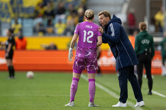 Goalkeeper Jennifer Falk and head coach Tony Gustavsson of