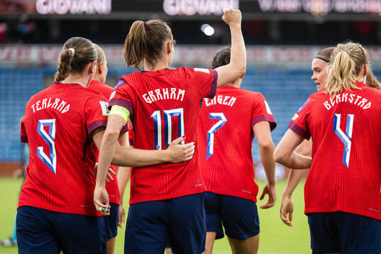 Elisabeth Terland and Cathinka Tandberg of Norway celebrates