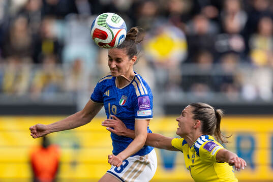 Martina Lenzini of Italy and Johanna Rytting Kaneryd of