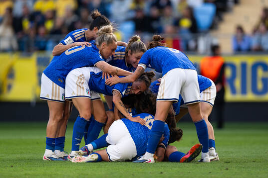 Martina Piemonte of Italy celebrates with team mates